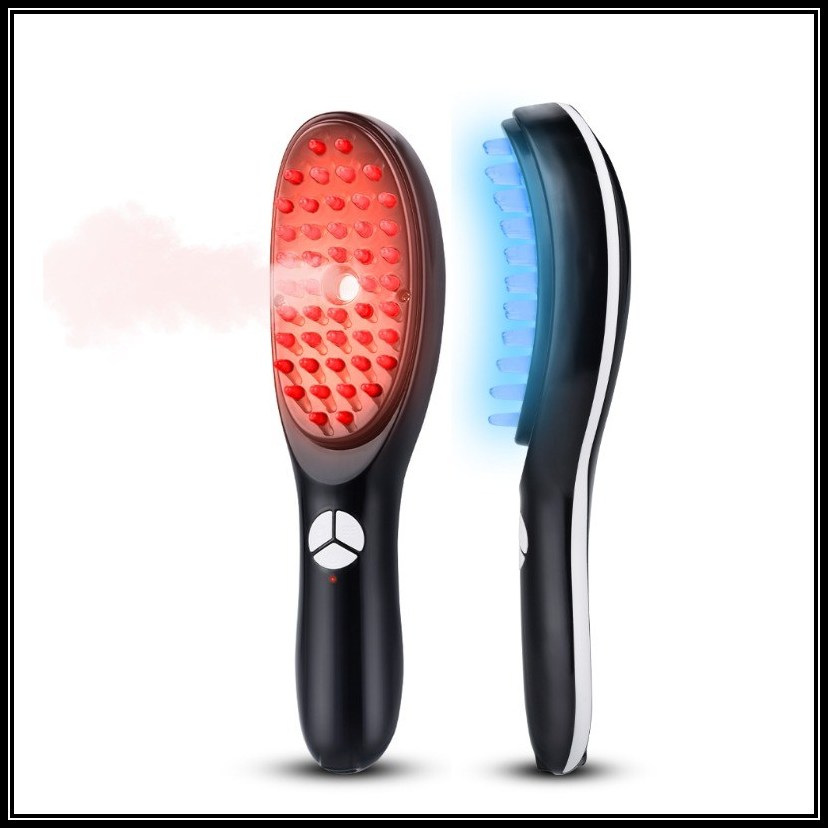 Electric massage comb by GlowGetter with ergonomic design and vibrating bristles for scalp health and hair growth.